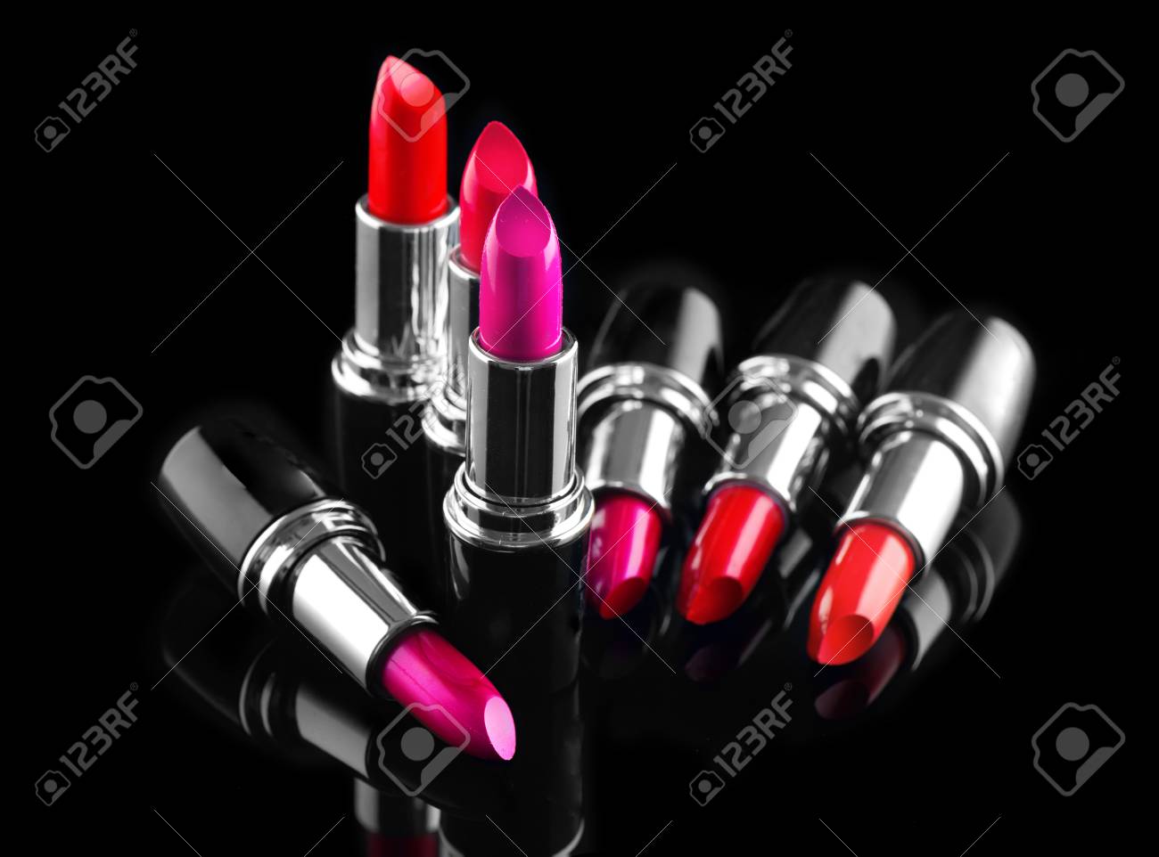 Lipstick. Professional makeup and beauty. Lipstick tints palette closeup. Colorful lipsticks over black background - 95303461 Lipstick. Professional makeup and beauty. Lipstick tints palette closeup. Colorful lipsticks over black background - 95303461