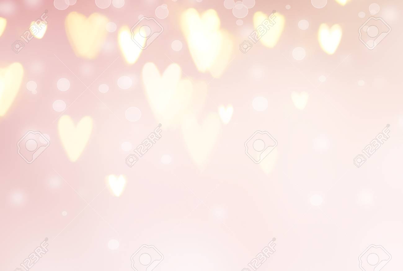 Valentine's Day background. Abstract glowing hearts on pink holiday backdrop - 95303466 Valentine's Day background. Abstract glowing hearts on pink holiday backdrop - 95303466