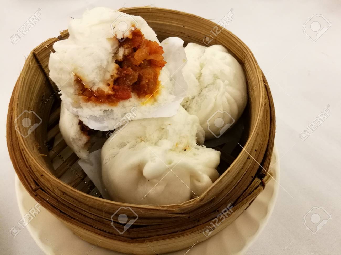 chinese food in china town bbq pork stuff steam bun on the bamboo