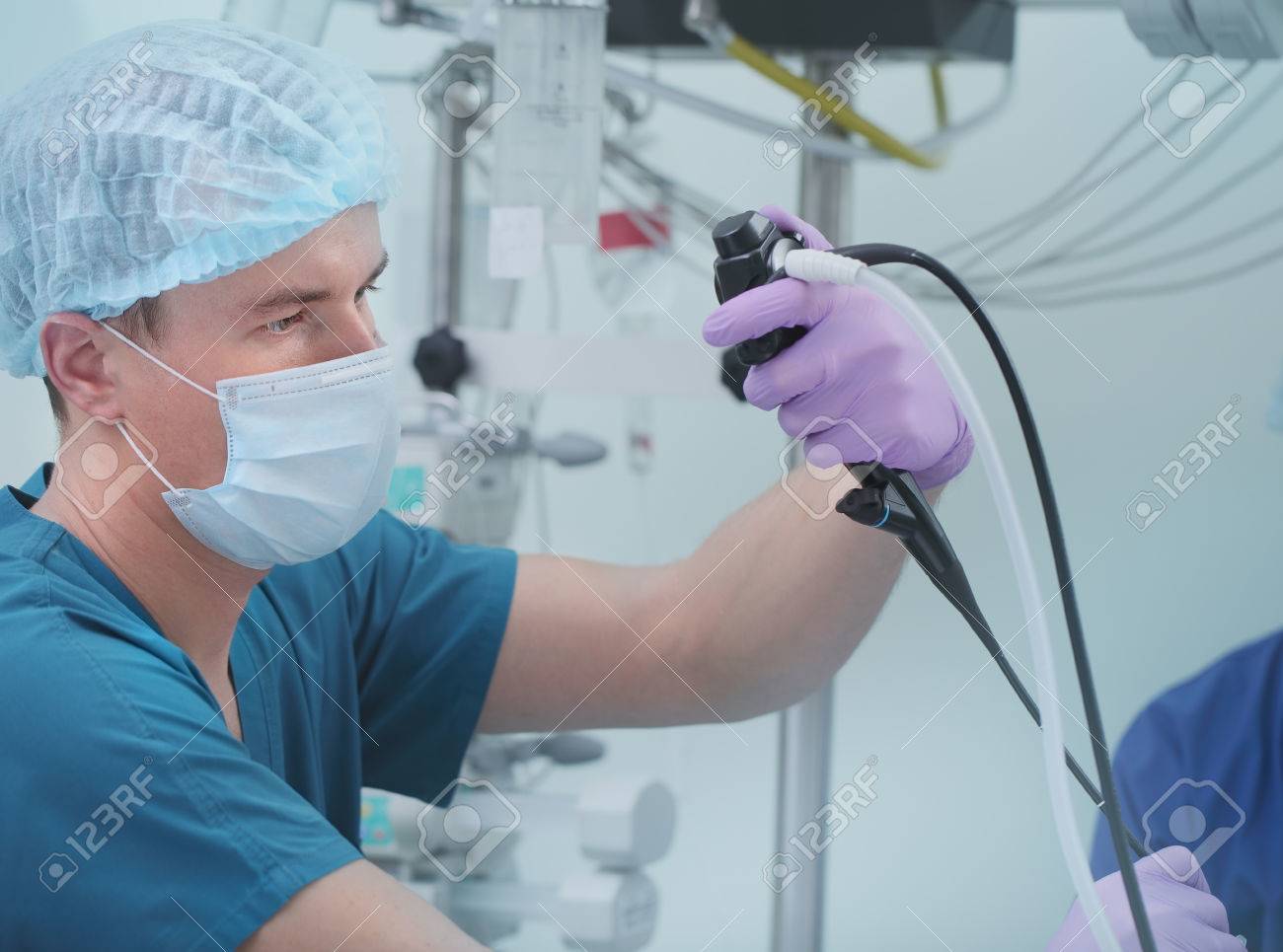 Male doctor performing endoscopy research. - 61178475 Male doctor performing endoscopy research. - 61178475