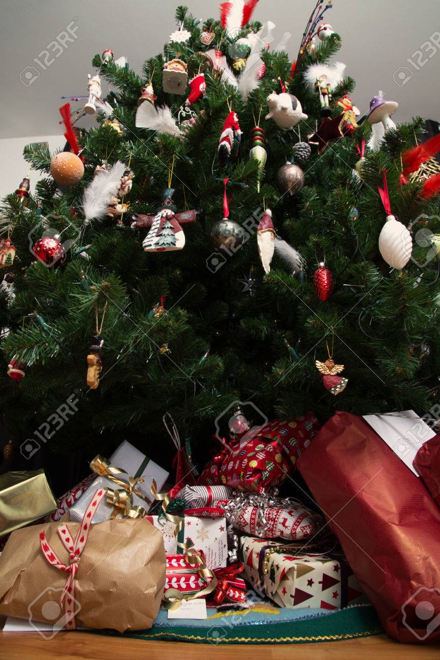 Christmas Presents Under A Christmas Tree Sfrom Below With A Wide Angle Lens Stock Christmas Presents Under A Christmas Tree Sfrom Below With A Wide Angle Lens Stock