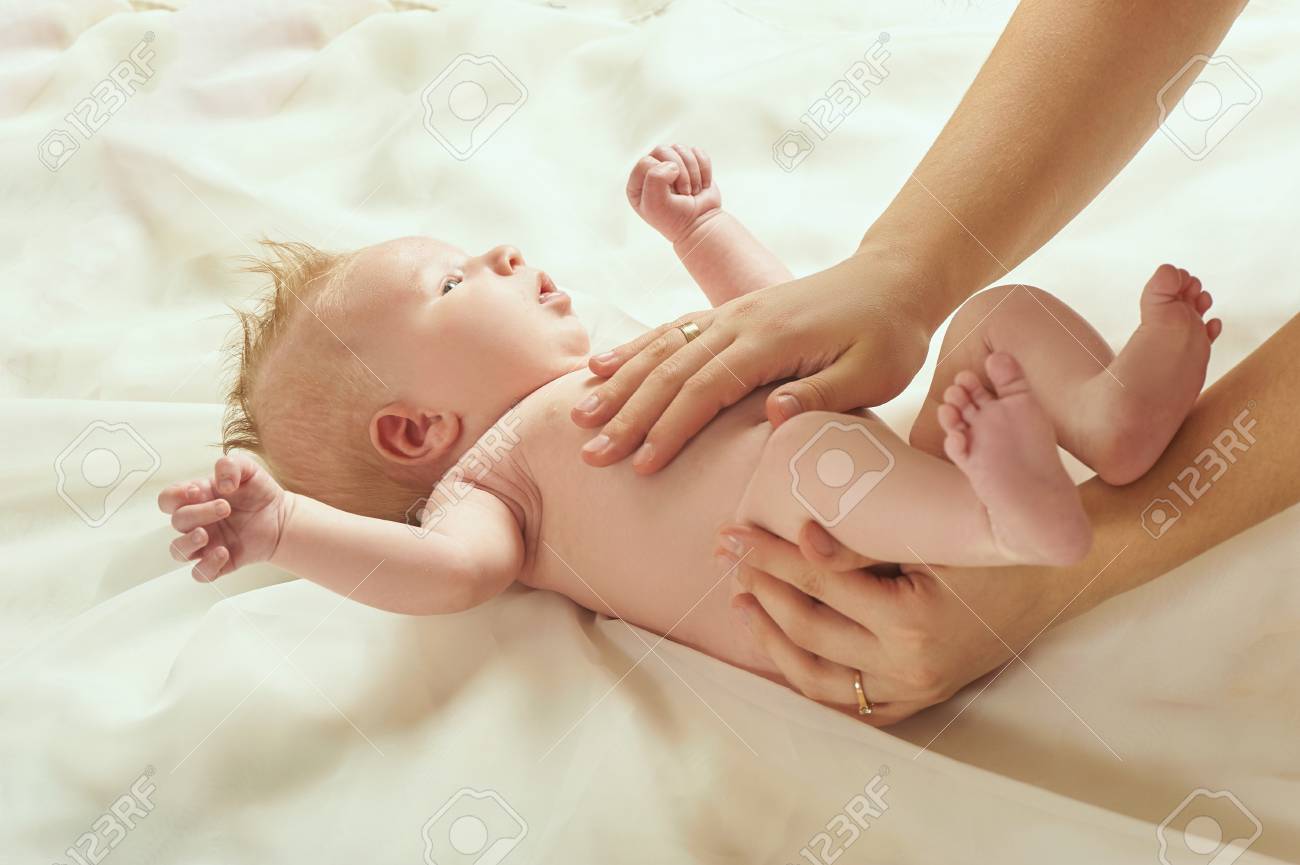 Blond Babe Lies On The Bed And Receives A Tummy Massage Stock Photo 103364580 Blond Babe Lies On The Bed And Receives A Tummy Massage Stock Photo 103364580