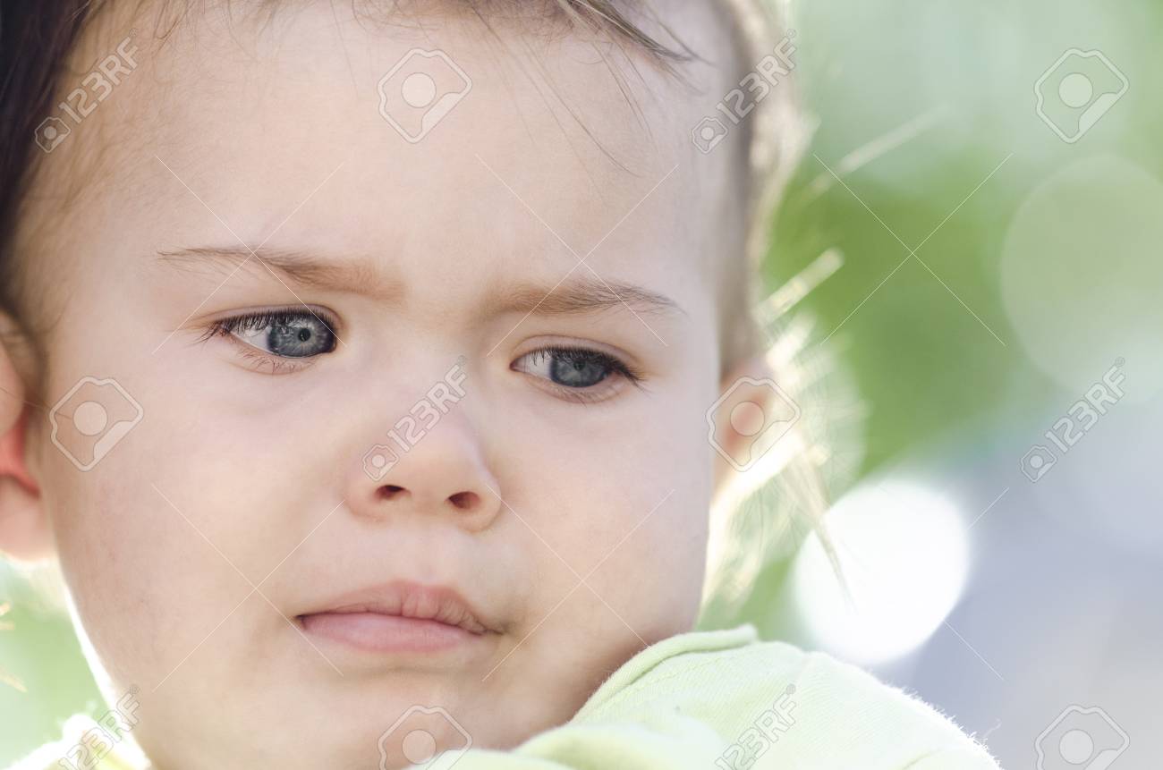 Closeup Of Sad Baby Cry In A Park Stock Photo Picture And Royalty Free Image Image