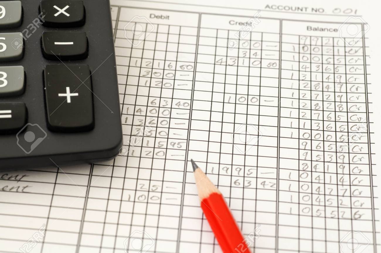 handwritten accounting ledger showing bookkeeping using pencil accounting ledger book
