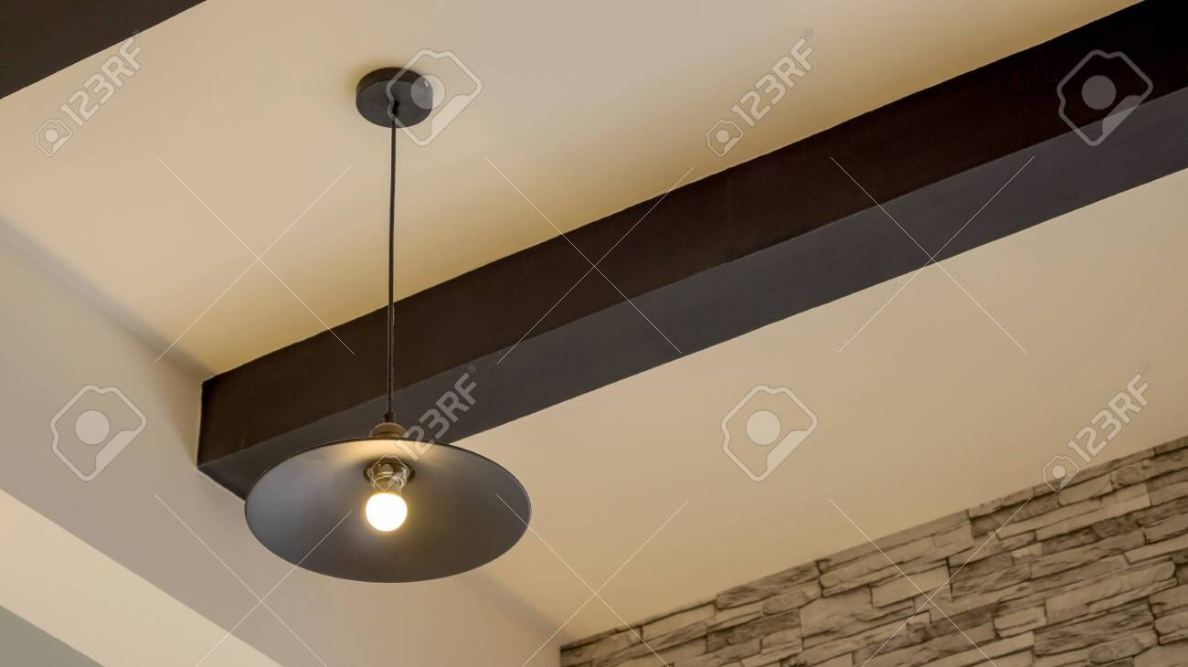 A Lamp Hanging On A Ceiling Stock Photo Picture And Royalty Free