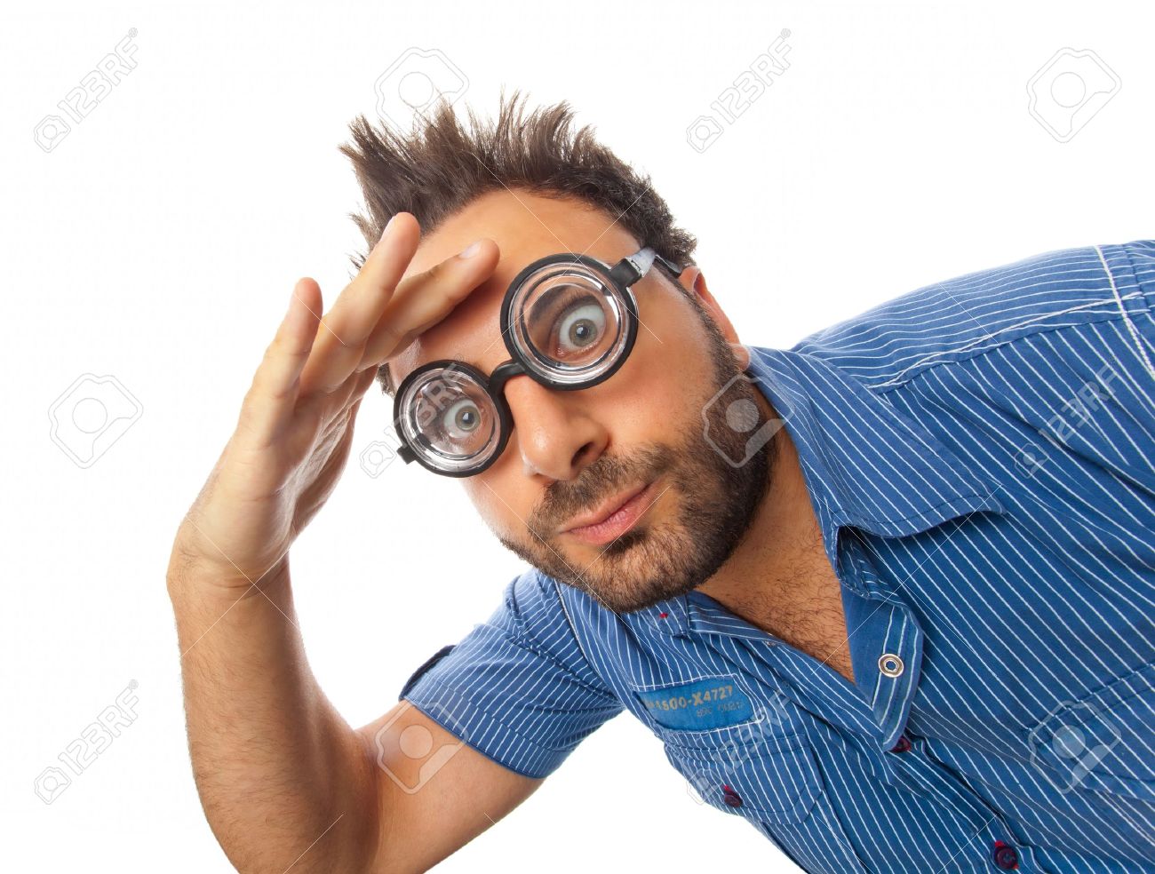 Young boy with a surprised expression with eye glasses - 20718453 Young boy with a surprised expression with eye glasses - 20718453