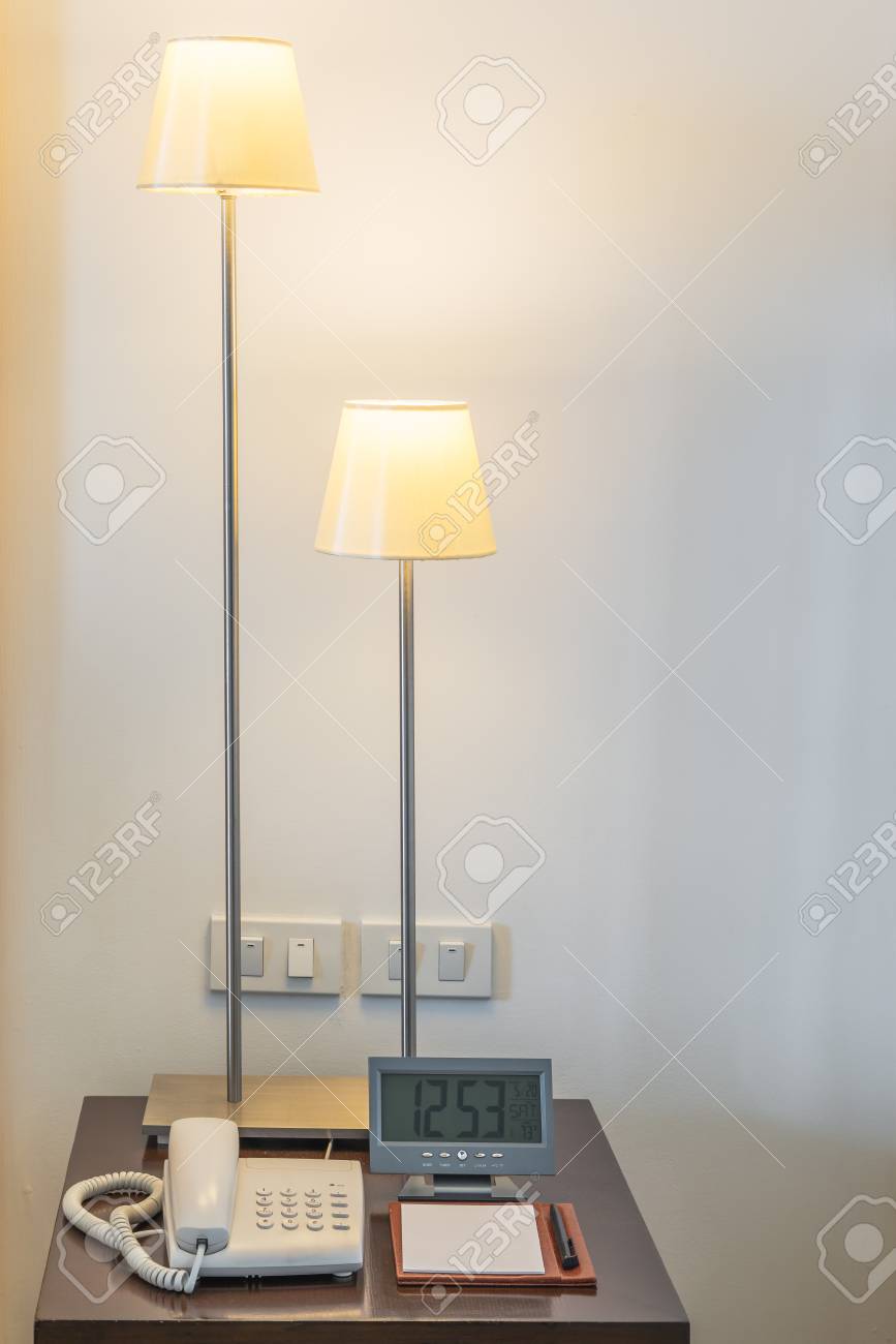 modern standing lamp unique modern standing lamp bedside table alarm clock and telephone with note pad in bedroom stock standing lamp bedside table alarm clock and telephone modern standing lamp unique modern standing lamp bedside table alarm clock and telephone with note pad in bedroom stock standing lamp bedside table alarm clock and telephone