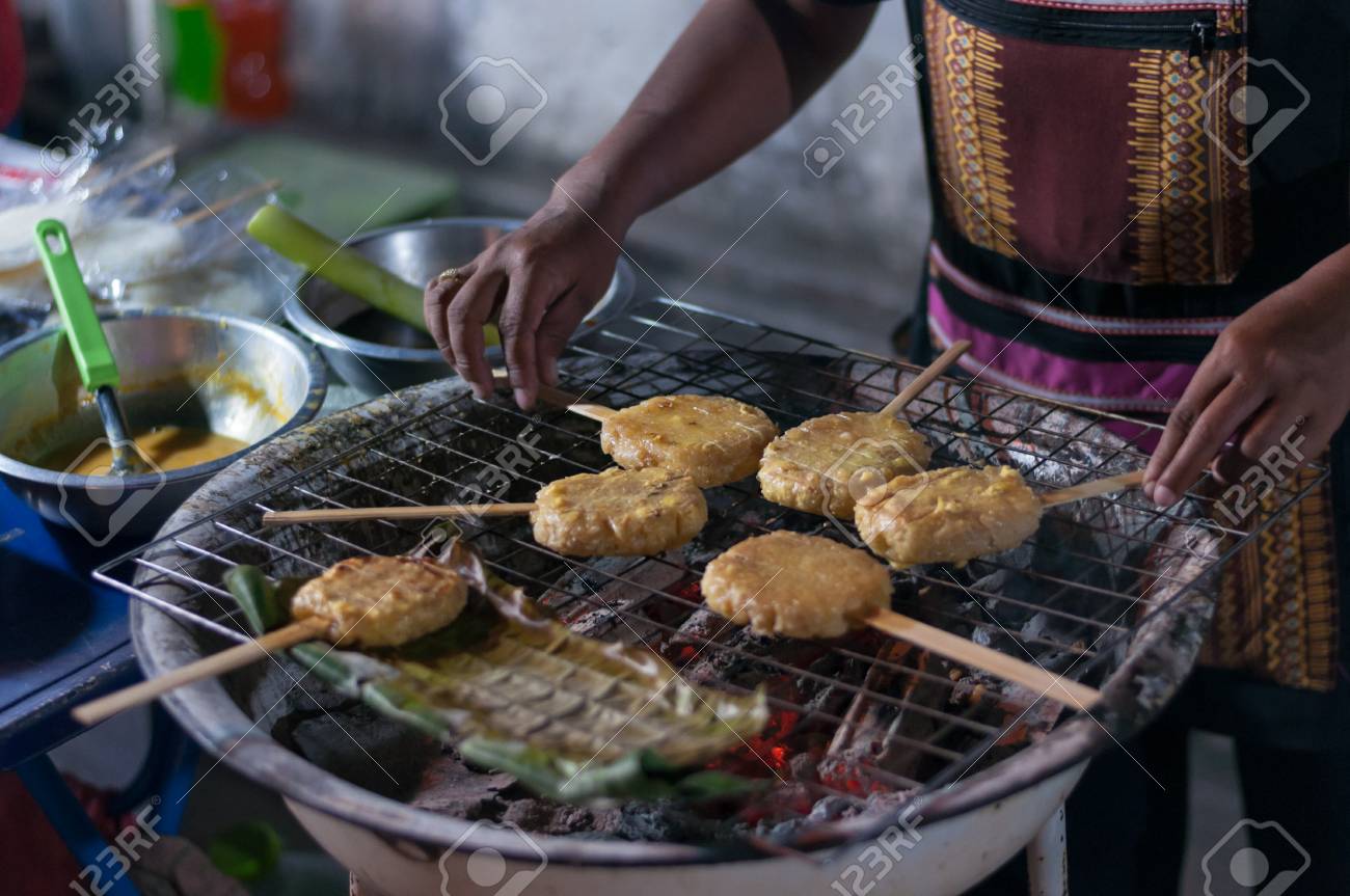 Sticky Rice Grilled On Stove Tasty Snack North East Thai Cold Weather Stock Photo Sticky Rice Grilled On Stove Tasty Snack North East Thai Cold Weather Stock Photo