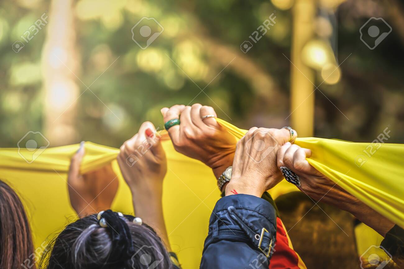 United People Close Up Their Hands Rise Up The Holy Huge Yellow Stock Photo Picture And Royalty Free Image Image