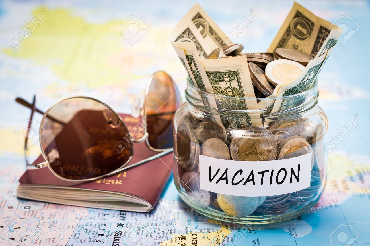 vacation budget concept vacation money savings in a glass jar