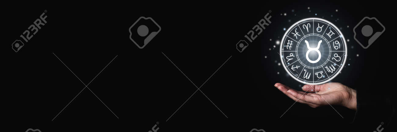 Female palm holds a luminous sign with zodiac signs symbols in the dark. Banner. - 171756645 Female palm holds a luminous sign with zodiac signs symbols in the dark. Banner. - 171756645