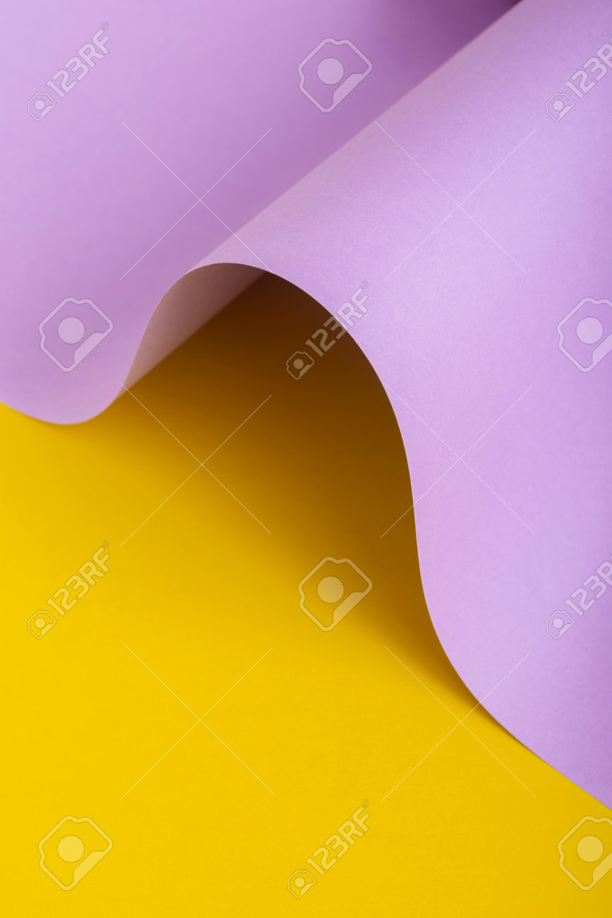 Wave from lilac cardboard on a yellow background. Top view, flat lay. - 171847661 Wave from lilac cardboard on a yellow background. Top view, flat lay. - 171847661