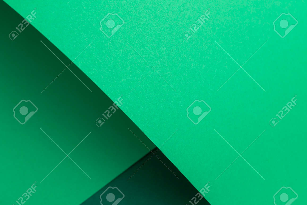 Green cardboard background design folded geometrically. Top view, flat lay. - 171847683 Green cardboard background design folded geometrically. Top view, flat lay. - 171847683