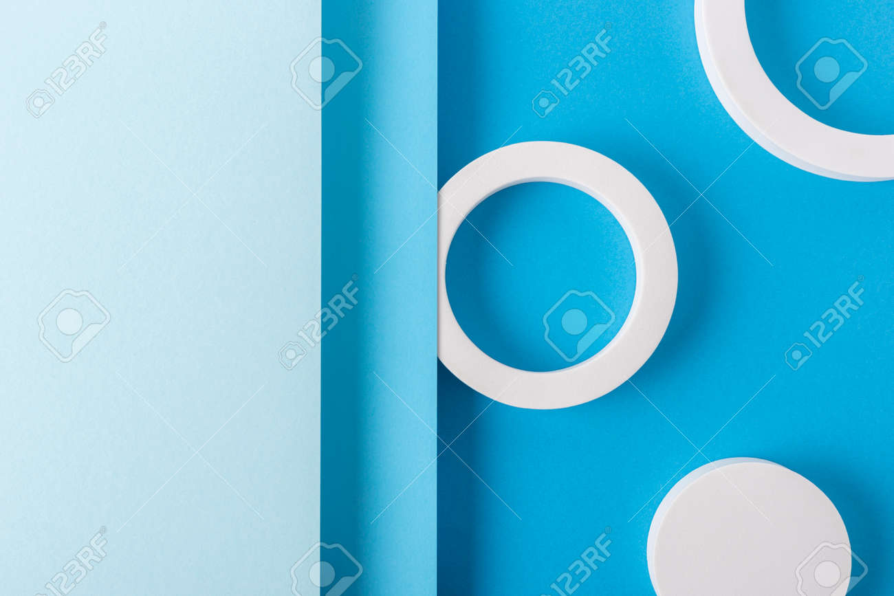 Round podiums on light blue background design of folded paper material. Top view, flat lay. - 171847689 Round podiums on light blue background design of folded paper material. Top view, flat lay. - 171847689