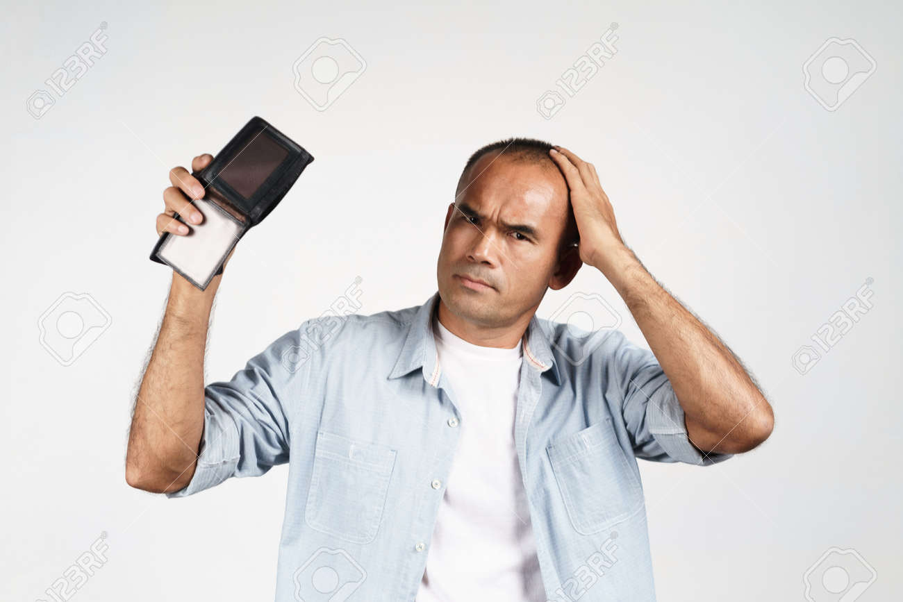 Upset mature man holding his empty wallet on white background. financial crisis, bankruptcy, no money, bad economy Concept. - 171949174 Upset mature man holding his empty wallet on white background. financial crisis, bankruptcy, no money, bad economy Concept. - 171949174