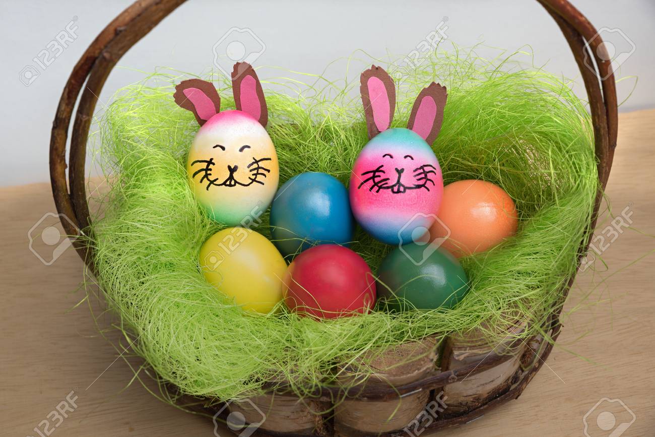 Rustic Easter Basket With A Handle And Colorful Eggs Funny Easter Stock Photo Picture And Royalty Free Image Image 97320169