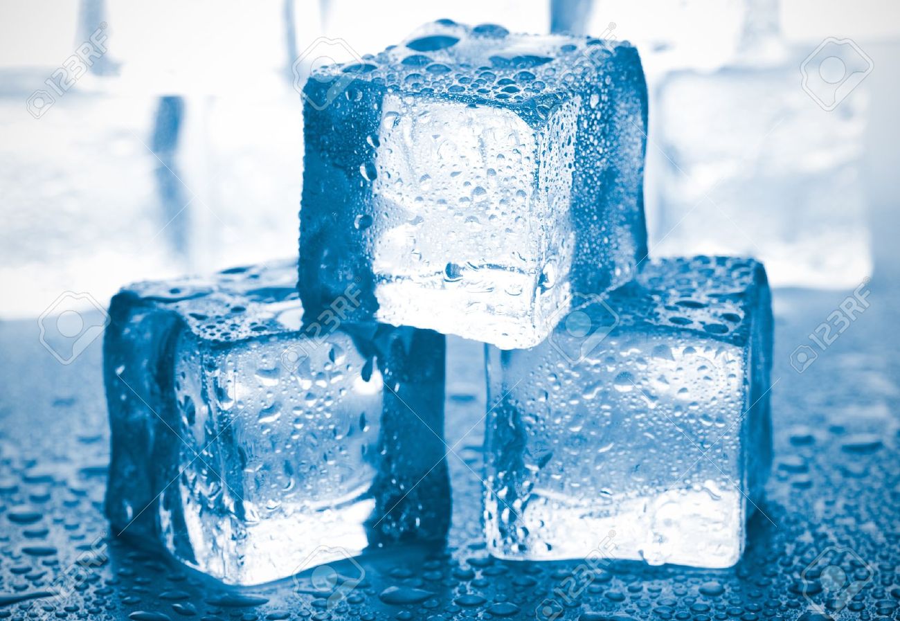 melting ice cubes on glass table stock photo picture and royalty