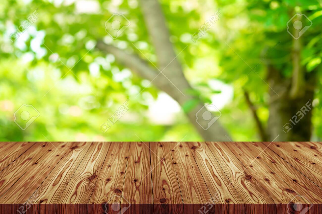 Perspective Wooden Table On Top Over Blur Natural Background Stock Photo Picture And Royalty Free Image Image