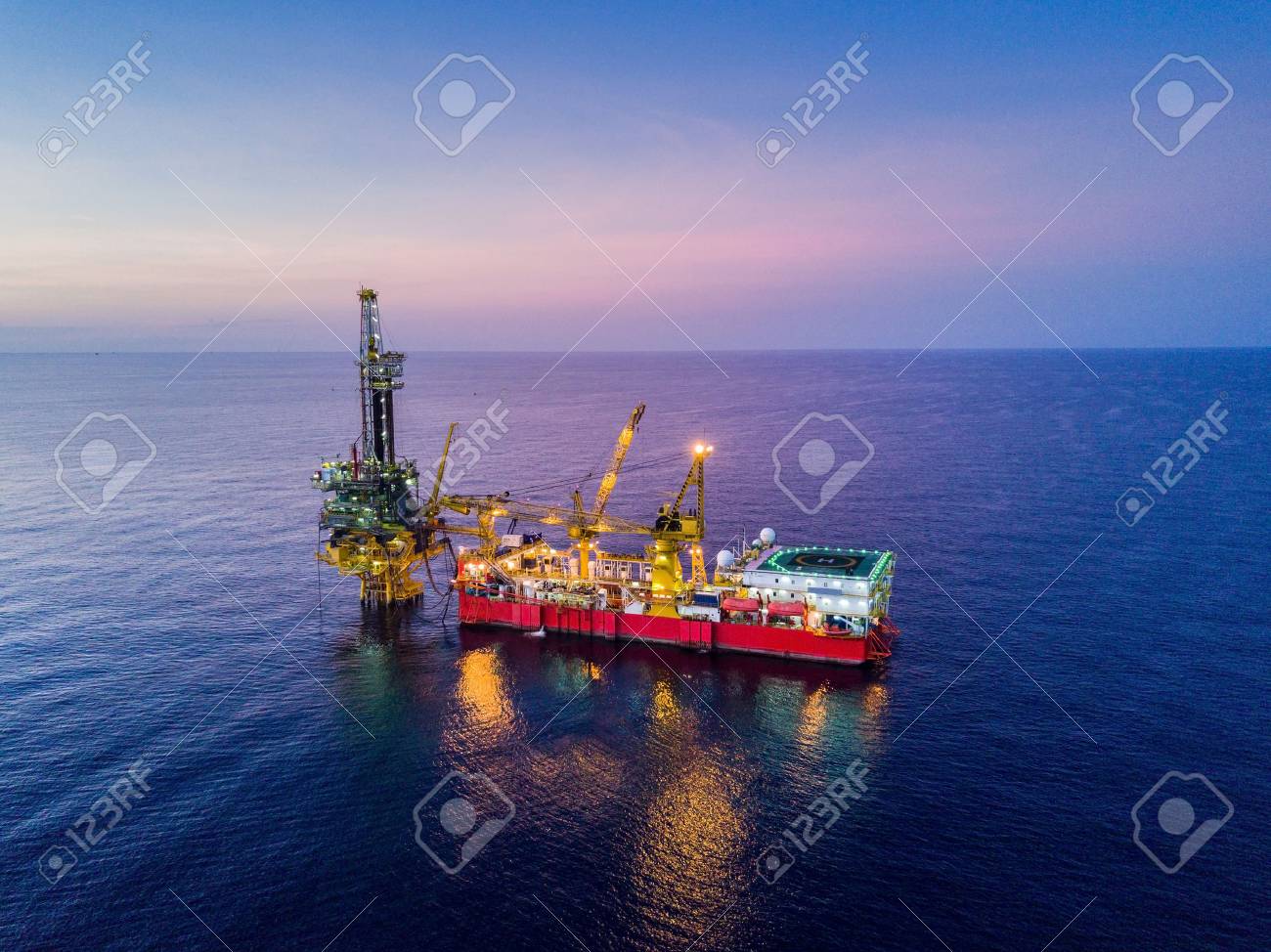 Aerial View of Tender Drilling Oil Rig (Barge Oil Rig) in The Middle of The Ocean at Surise Time - 87397793 Aerial View of Tender Drilling Oil Rig (Barge Oil Rig) in The Middle of The Ocean at Surise Time - 87397793
