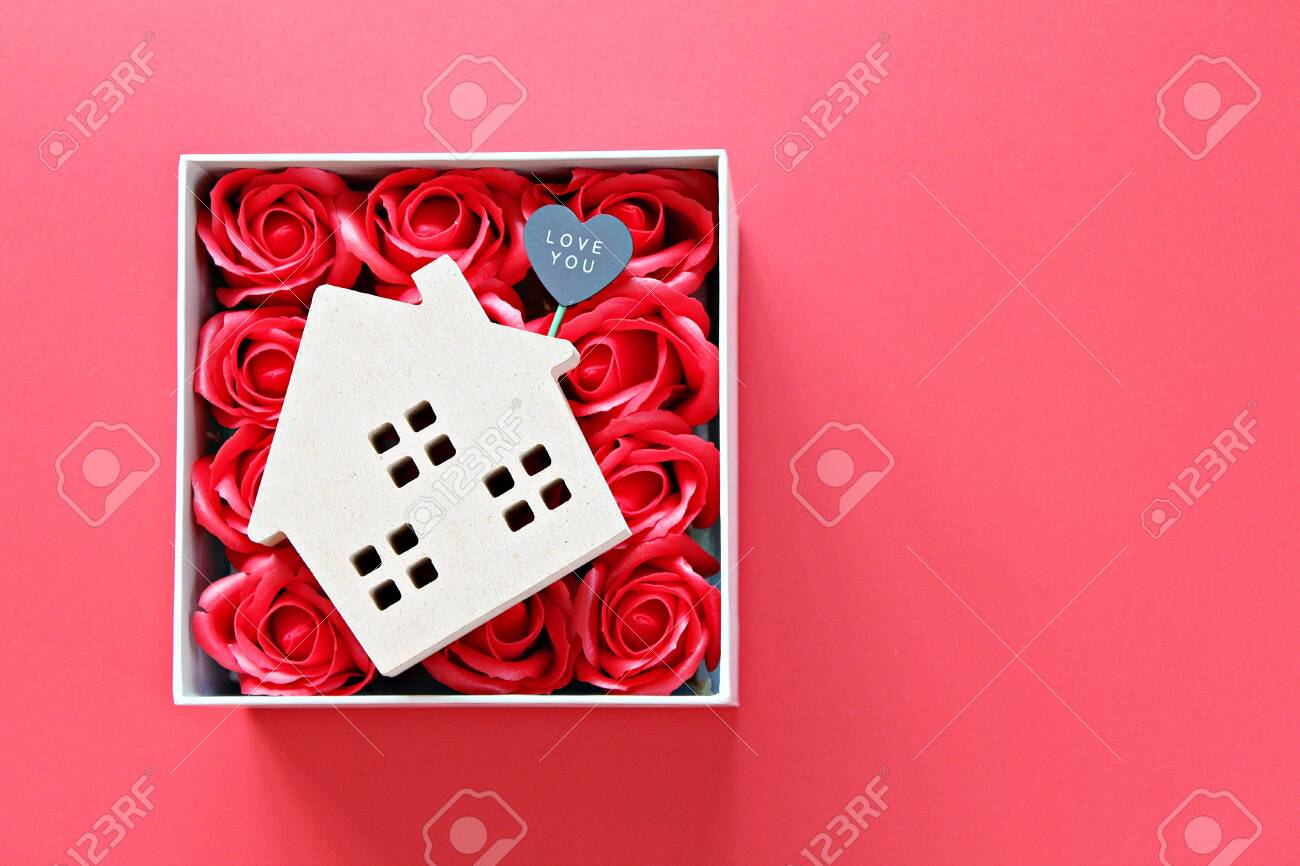 Business, finance, property ladder, mortgage loan, love, gifts or Valentine's day concept : Wood house model with love you tag and red roses on red background with copy space for adding or mock up - 140001967 Business, finance, property ladder, mortgage loan, love, gifts or Valentine's day concept : Wood house model with love you tag and red roses on red background with copy space for adding or mock up - 140001967