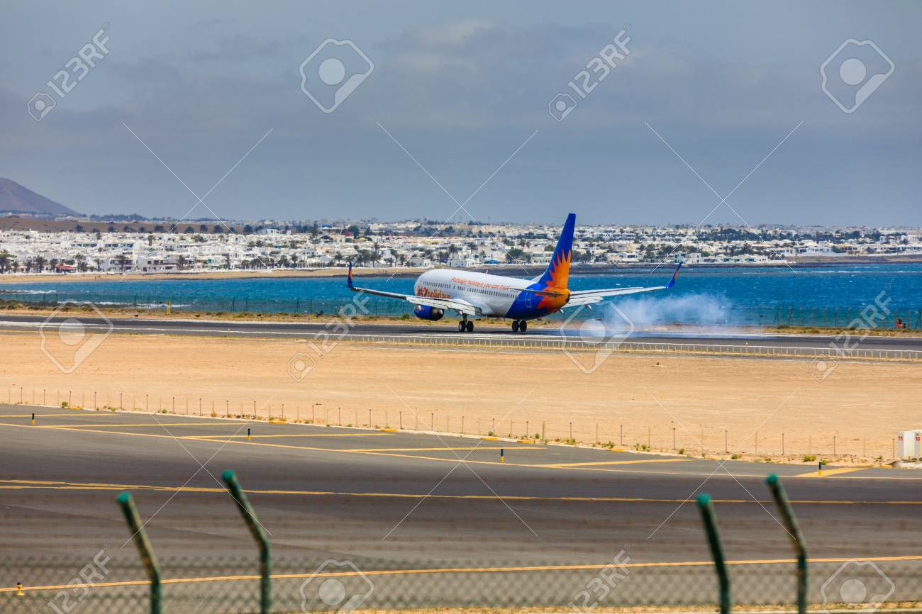 ARECIFE, SPAIN - APRIL, 15 2017: Boeing 737-800 of Jet2holidays with the registration G-JZHA landing at Lanzarote Airport - 81397891 ARECIFE, SPAIN - APRIL, 15 2017: Boeing 737-800 of Jet2holidays with the registration G-JZHA landing at Lanzarote Airport - 81397891