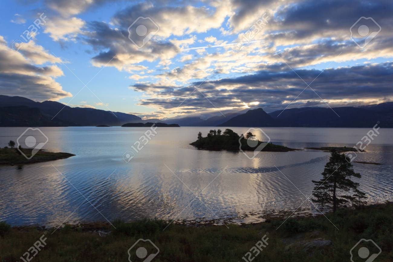 A beautiful and magical evening somewhere along the Hardangerfjord in Norway. - 81539381 A beautiful and magical evening somewhere along the Hardangerfjord in Norway. - 81539381
