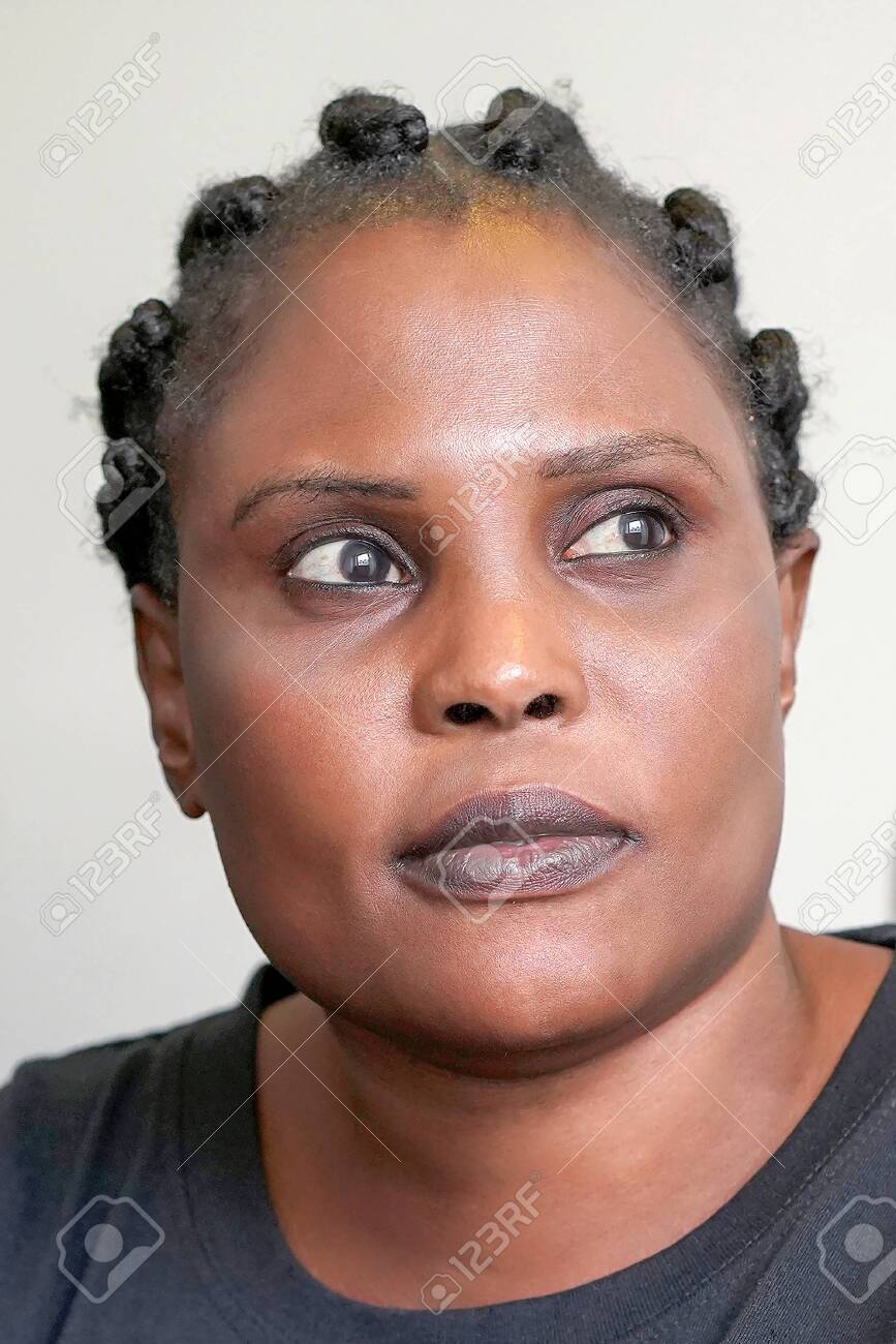 Download Face Of Sad African Woman In Profile Looking Up Emotion Of Fear Stock Photo Picture And Royalty Free Image Image 146060765
