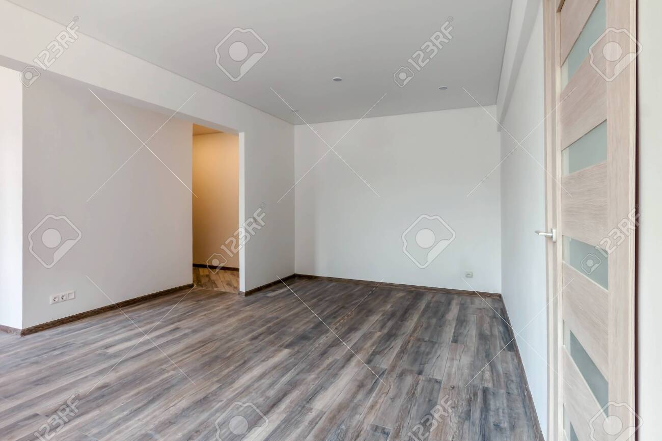 Empty White Room With Washed Floating Gray Wooden Laminate Flooring Stock Photo Picture And Royalty Free Image Image 135178455