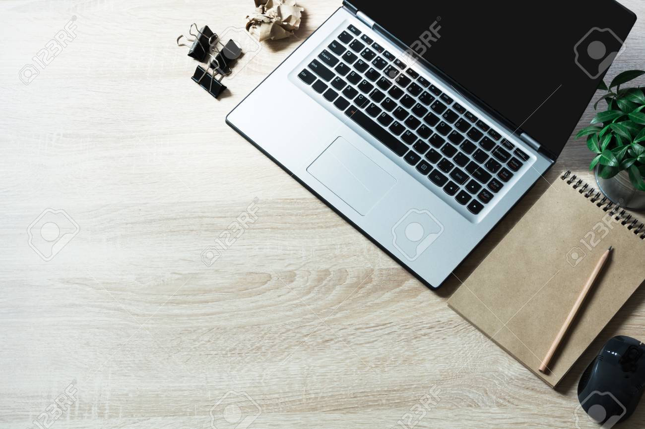 Open Laptop And On Office Wooden Desk Table. Top View And Copy Space. Stock  Photo, Picture and Royalty Free Image. Image 96464478., image size:1300x866
