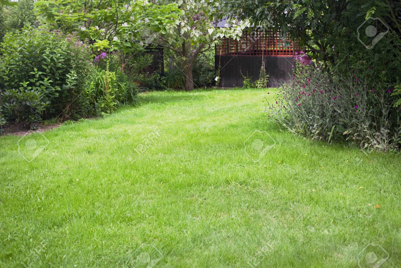 Summer House In The Beautiful Backyard Green Garden Landscape And Fresh,  Green Lawn Background With A Lot Pf Space. Stock Photo, Picture and Royalty  Free Image. Image 152500283.