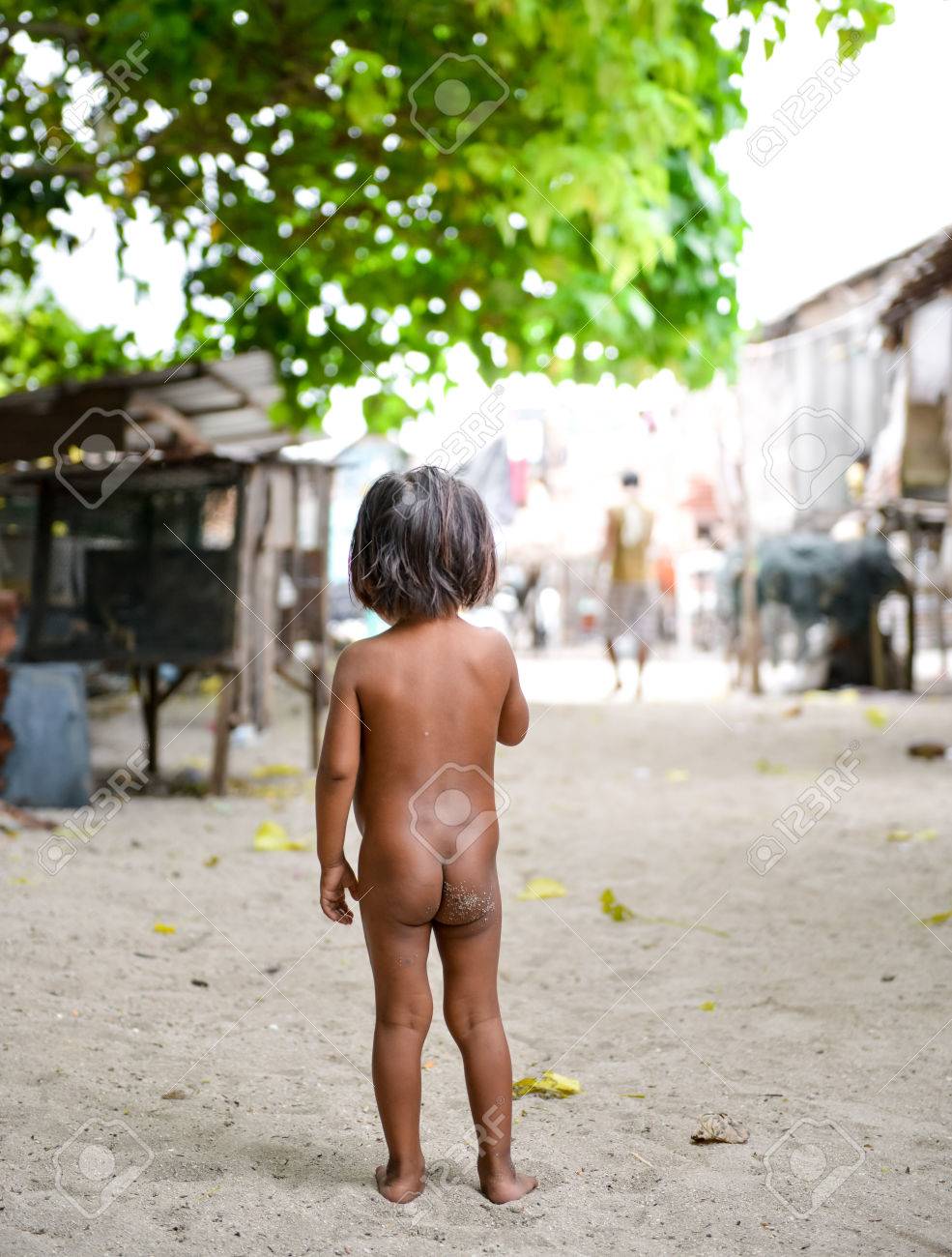 Semporna, Malaysia - Oct 2, 2014 A Famle Bajau Kid Standing In The