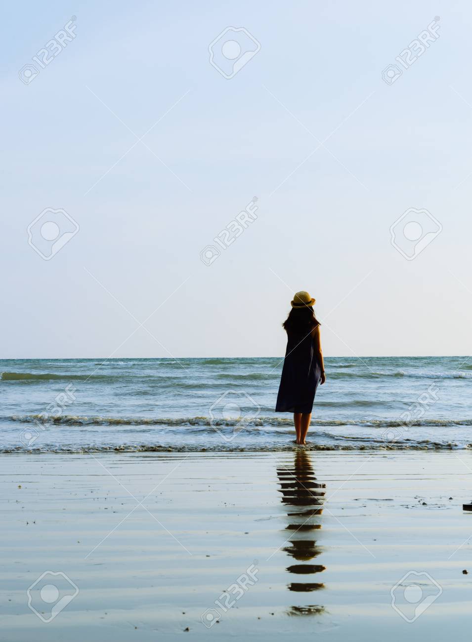 Single Girl Enjoying Herself With Background Of Peaceful Beach ...