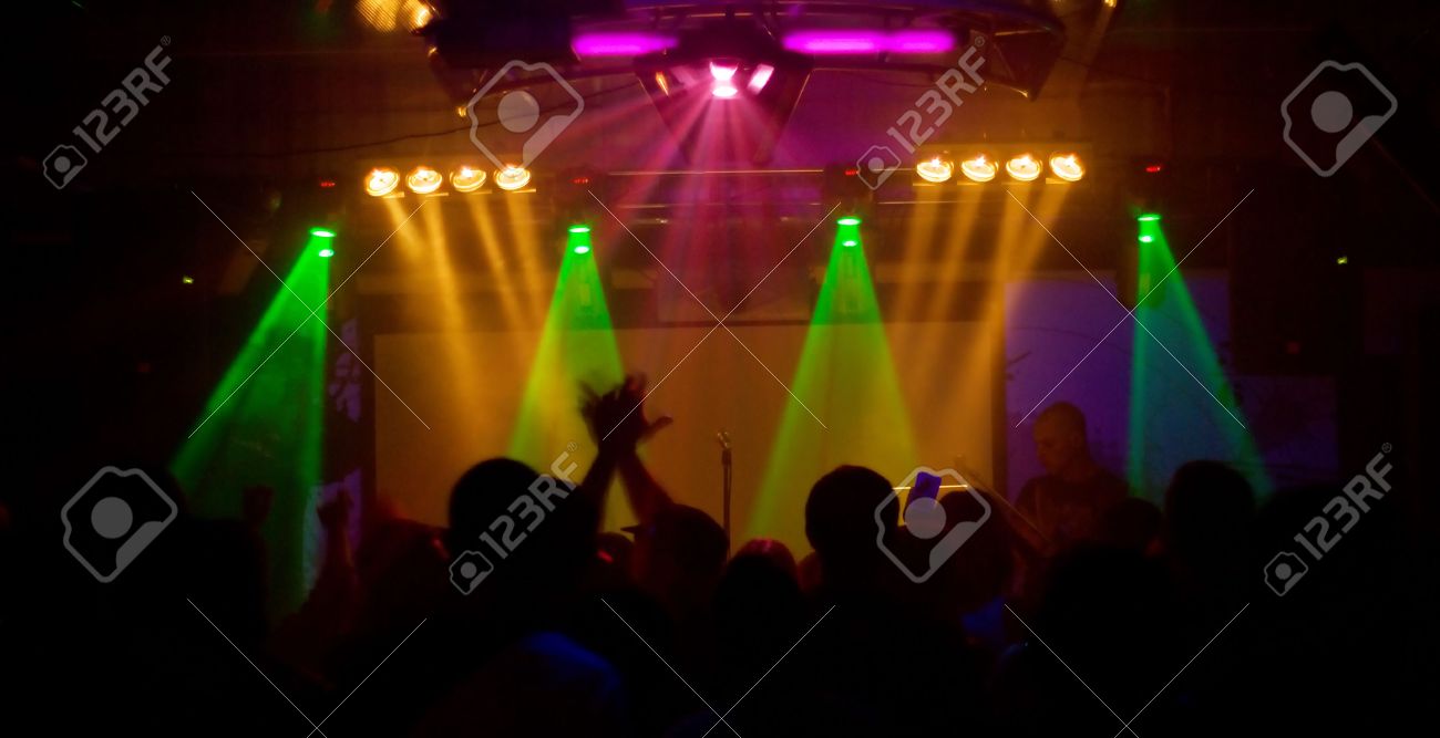 hands at rock concert, silhouettes against stage lighting - 5859276 hands at rock concert, silhouettes against stage lighting - 5859276