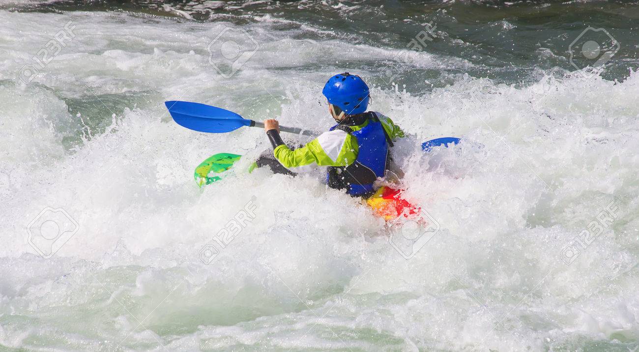 Female kayaker in the white water of tghe river - 40170021 Female kayaker in the white water of tghe river - 40170021