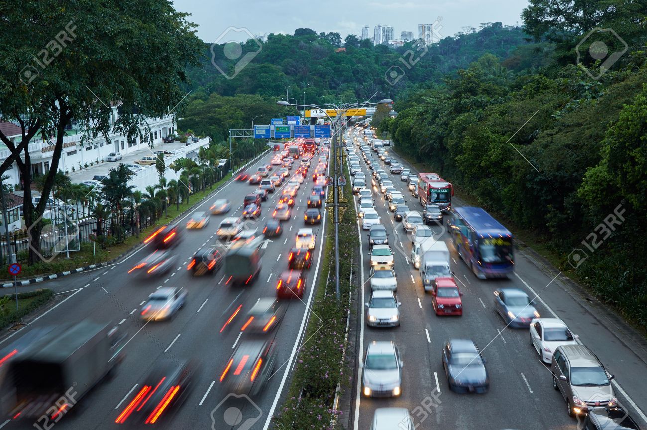 Evening traffic on the left driving road in Malaysia - 45565061 Evening traffic on the left driving road in Malaysia - 45565061