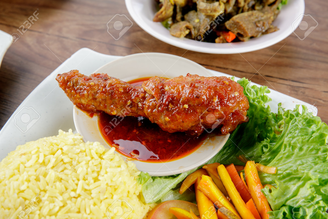 Delicious Malay Cuisine Nasi Minyak With Chili Chicken And Salad Stock Photo Picture And Royalty Free Image Image 161245518