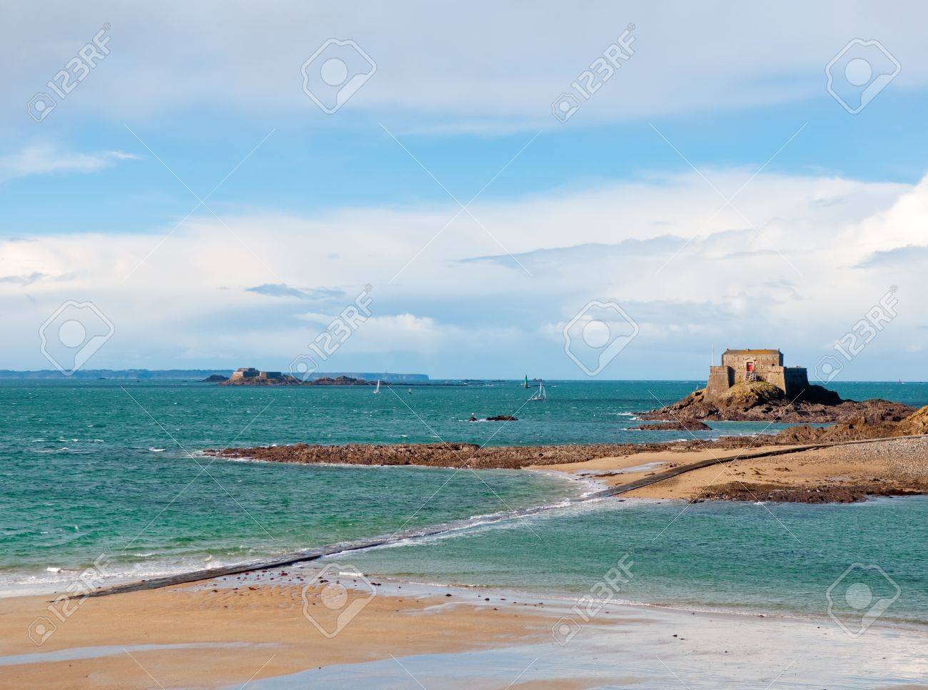 Low Tide In Saint Malo France View On Beach Mole And Fort