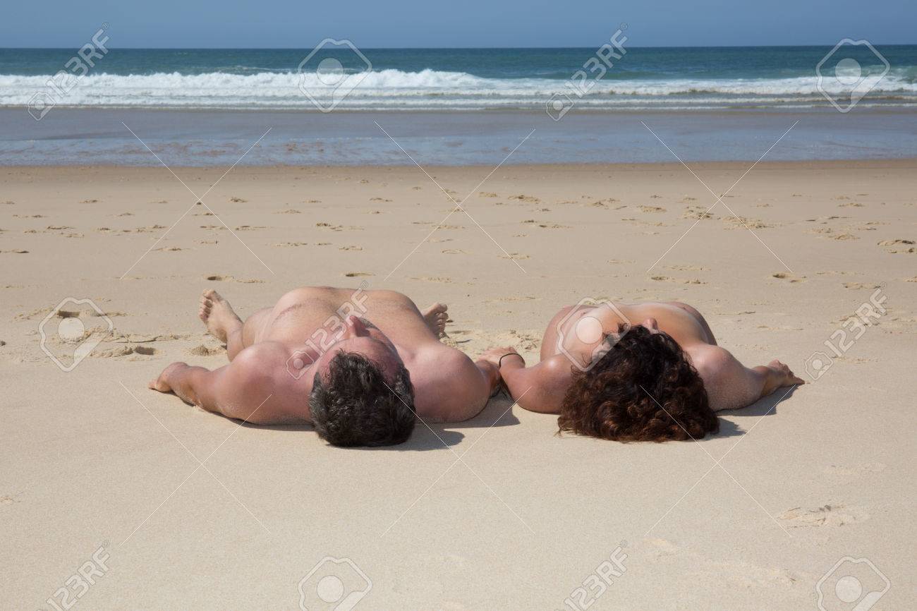 all about nudism and naturism Naturist And Loving Couple Lying On A Resort's White Sand Stock Photo,  Picture and Royalty Free Image. Image 63537272.