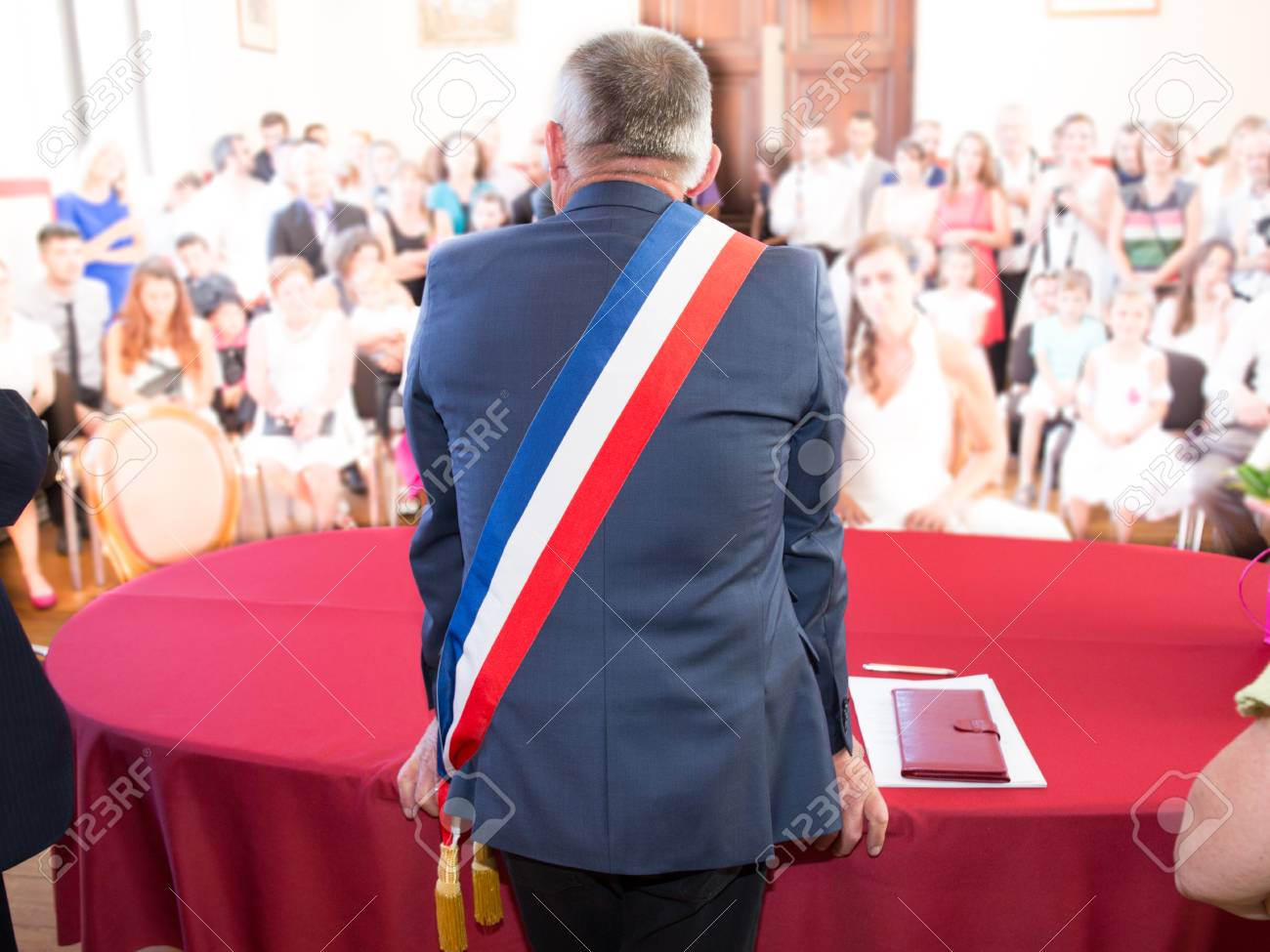 Back of French mayor with a scarf flag - 65723687 Back of French mayor with a scarf flag - 65723687