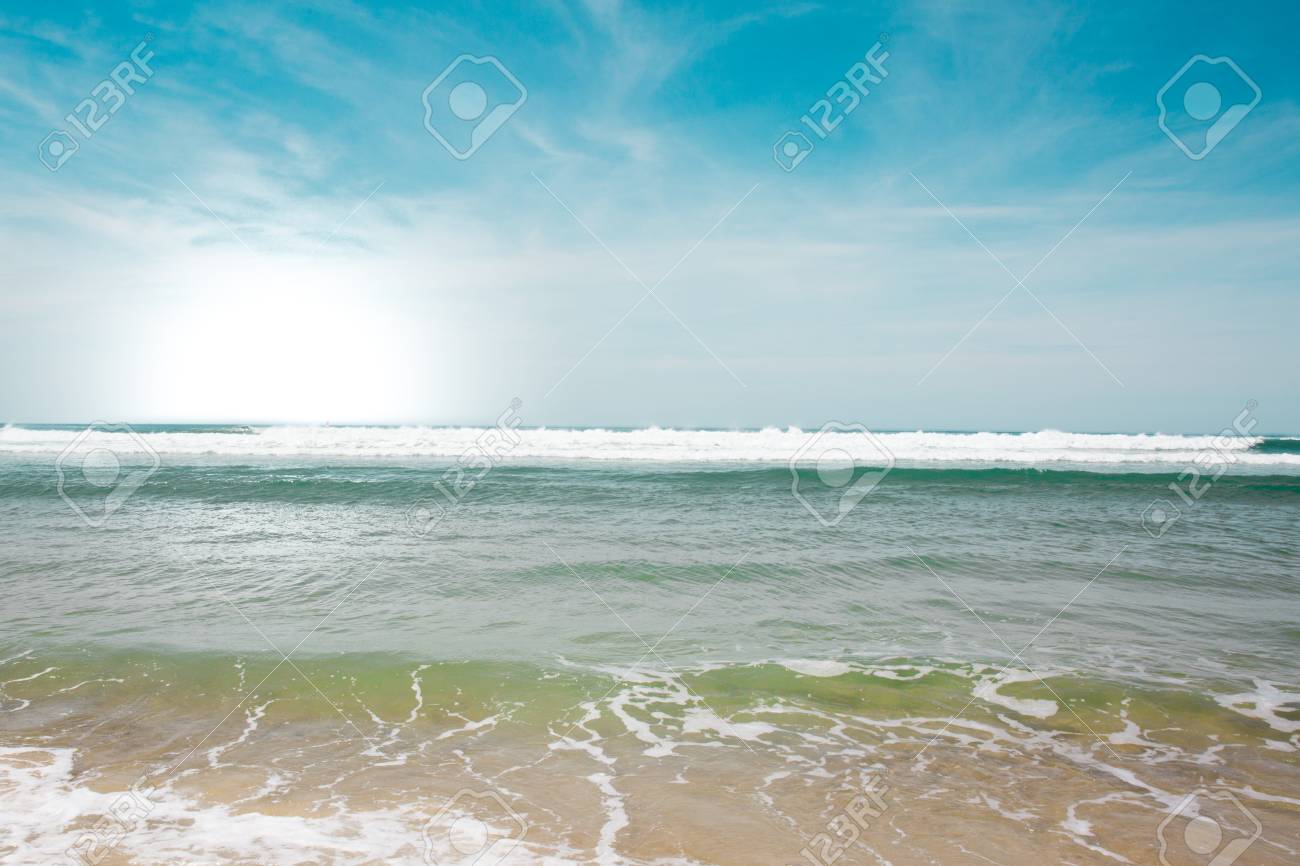 Beautiful Beach In Summer With Sand And Blue Sky Stock Photo, Picture and  Royalty Free Image. Image 84267678., image size:1300x866