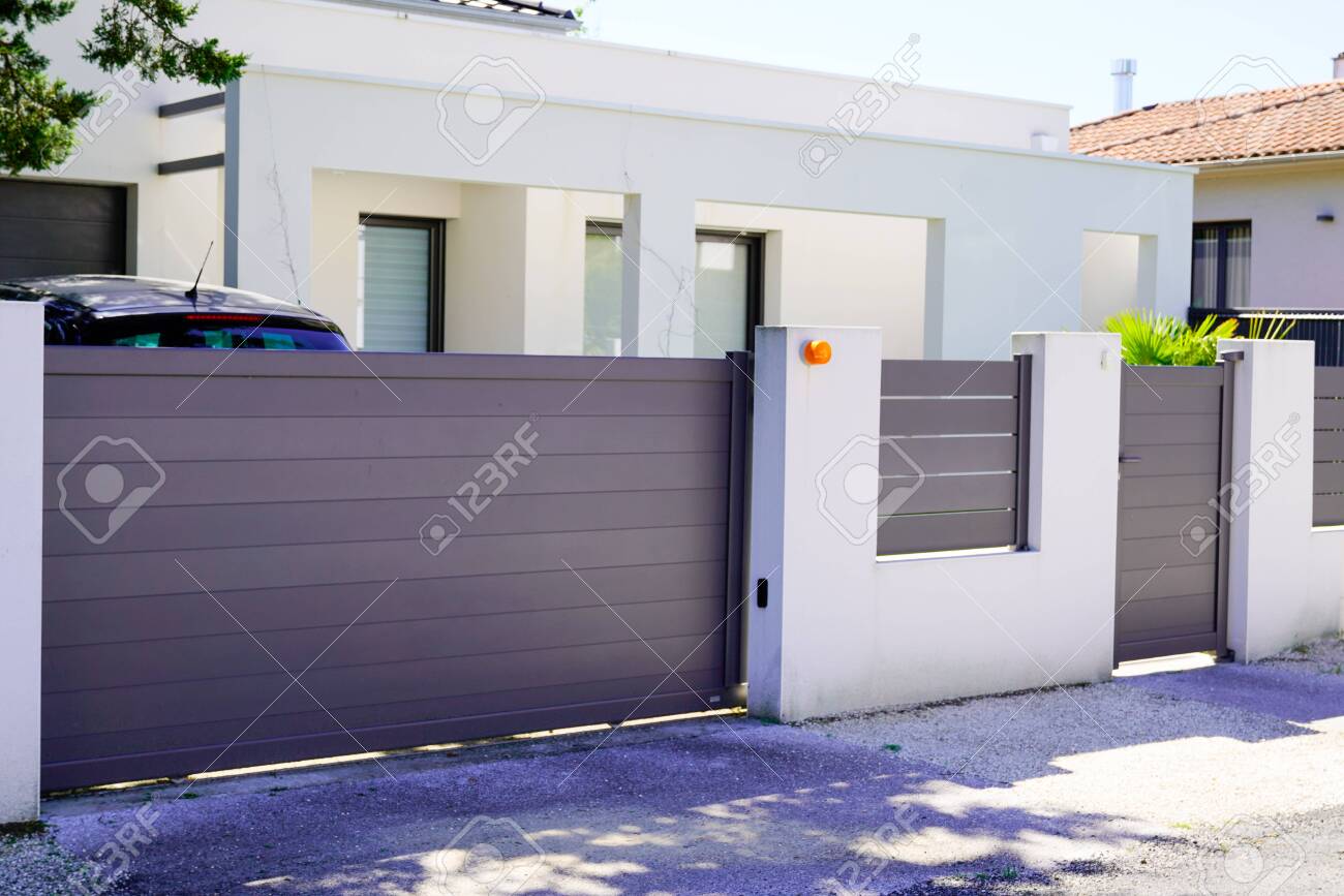 street suburb home grey brown dark metal aluminum house gate slats garden access door - 146571729 street suburb home grey brown dark metal aluminum house gate slats garden access door - 146571729
