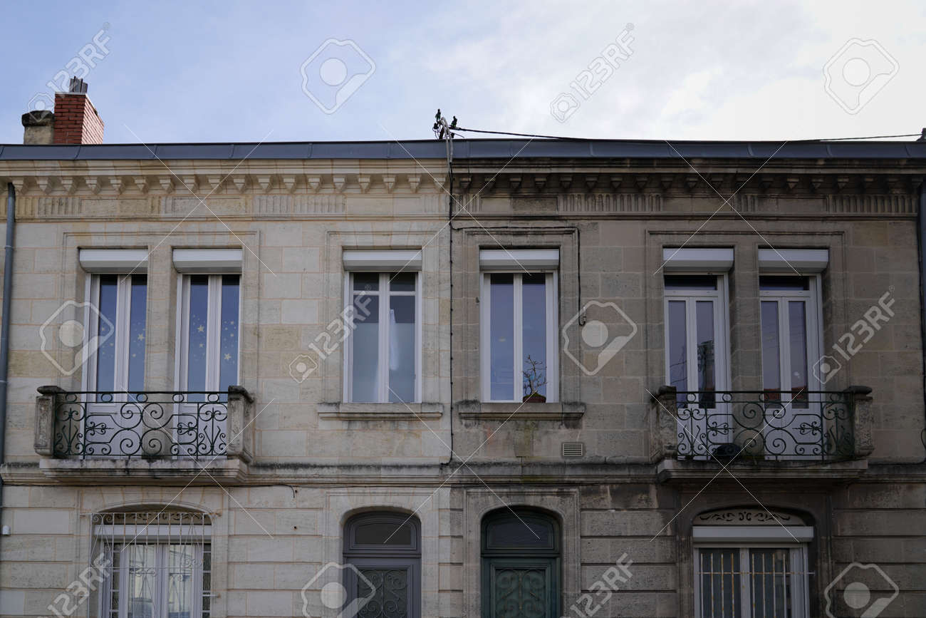 Outside renovation old building facades before and after cleaning washing wall house with industrial pressure water in facade exterior - 163255130 Outside renovation old building facades before and after cleaning washing wall house with industrial pressure water in facade exterior - 163255130