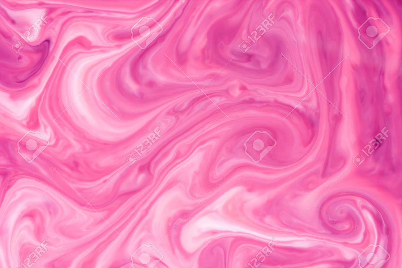 Red And White Paint Mixing Into Pink Color Background Stock Photo