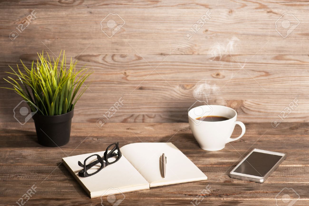 Working Table With Notepad Coffee Cup Pen Smartphone Glasses Stock Photo Picture And Royalty Free Image Image 43661254