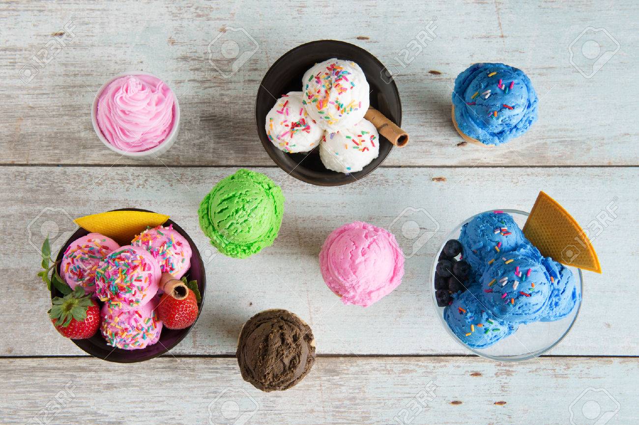 Top view strawberry, blueberry and vanilla ice cream in bowl on white rustic wooden background. - 50022415 Top view strawberry, blueberry and vanilla ice cream in bowl on white rustic wooden background. - 50022415