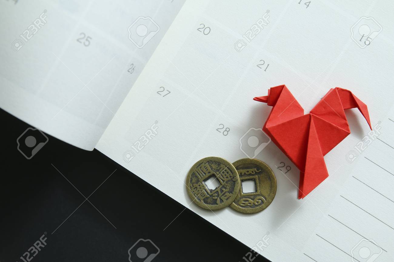 Chinese New Year Decorations On Planner With Focus On Chinese