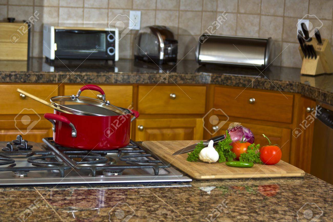 Kitchen Stove Top kitchen stove top with sauce pan stock photo, picture and royalty Kitchen Stove Top kitchen stove top with sauce pan stock photo, picture and royalty