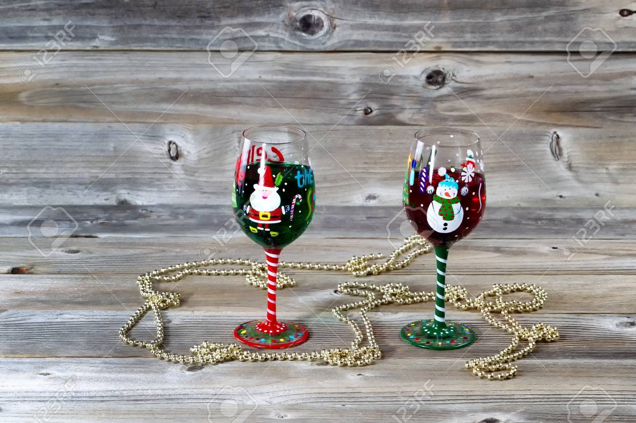 Horizontal Image Of Holiday Drinking Glasses Filled With Drink On Rustic Wood Stock Photo Horizontal Image Of Holiday Drinking Glasses Filled With Drink On Rustic Wood Stock Photo