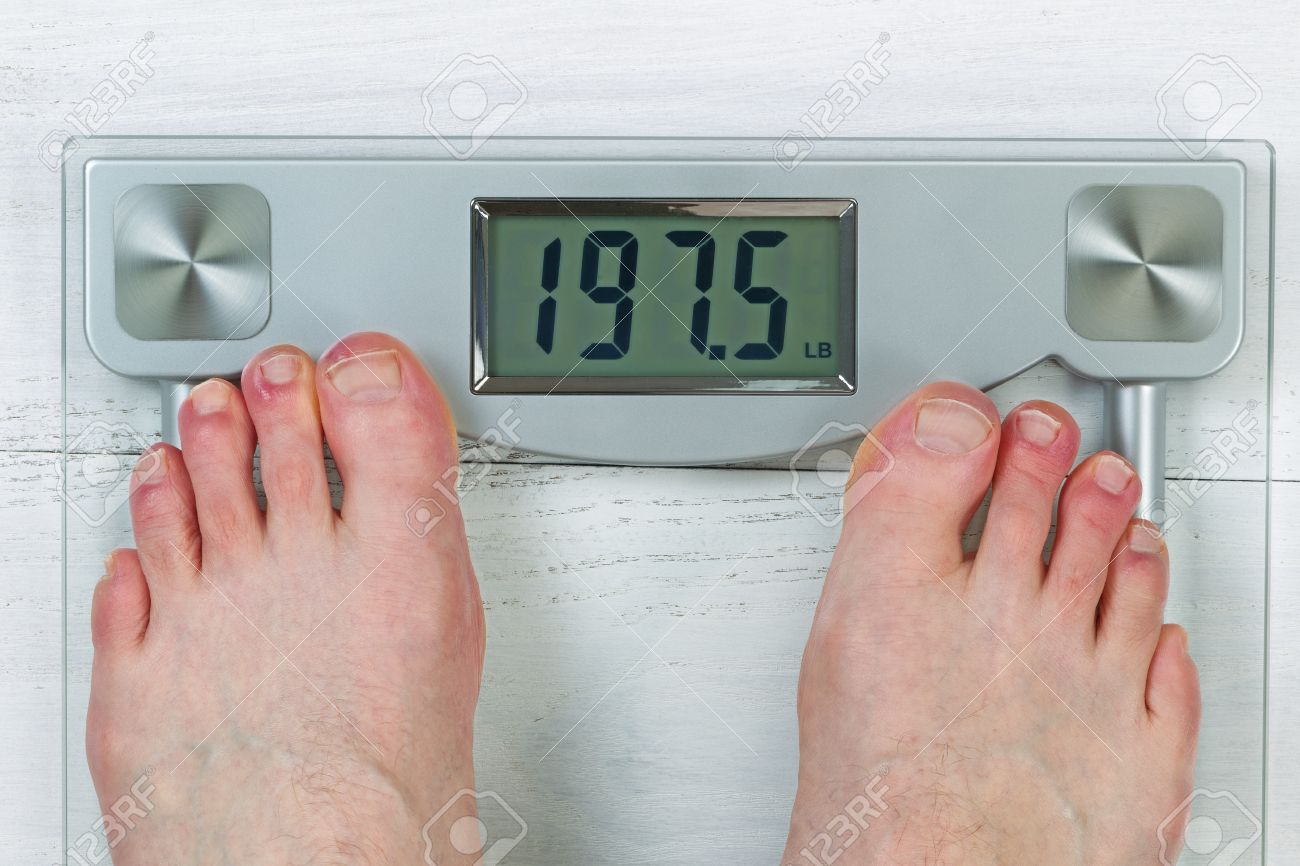 Stock P O Weight Scale Disbody Weight With Bare Male Feet Stock P O Weight Scale Disbody Weight With Bare Male Feet