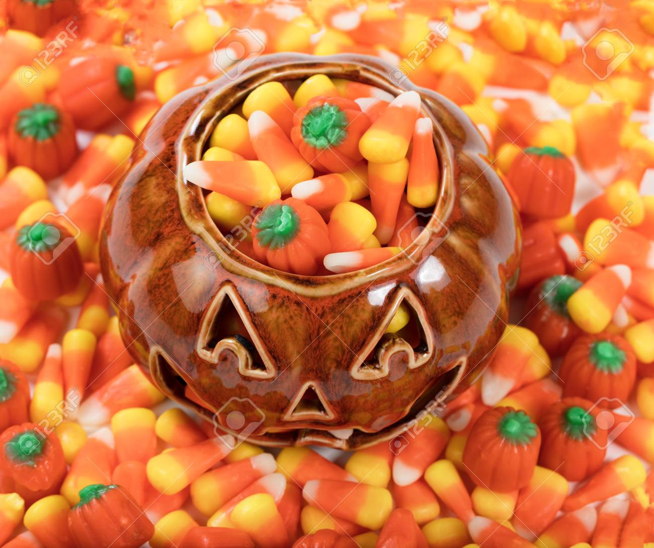 halloween candy treats in pumpkin container stock photo 85703342